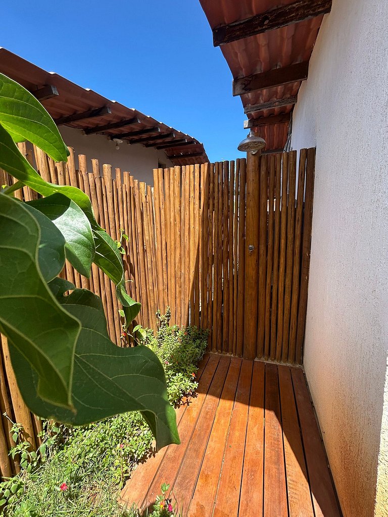 Suíte boutique com deck privativo [café/transfer]