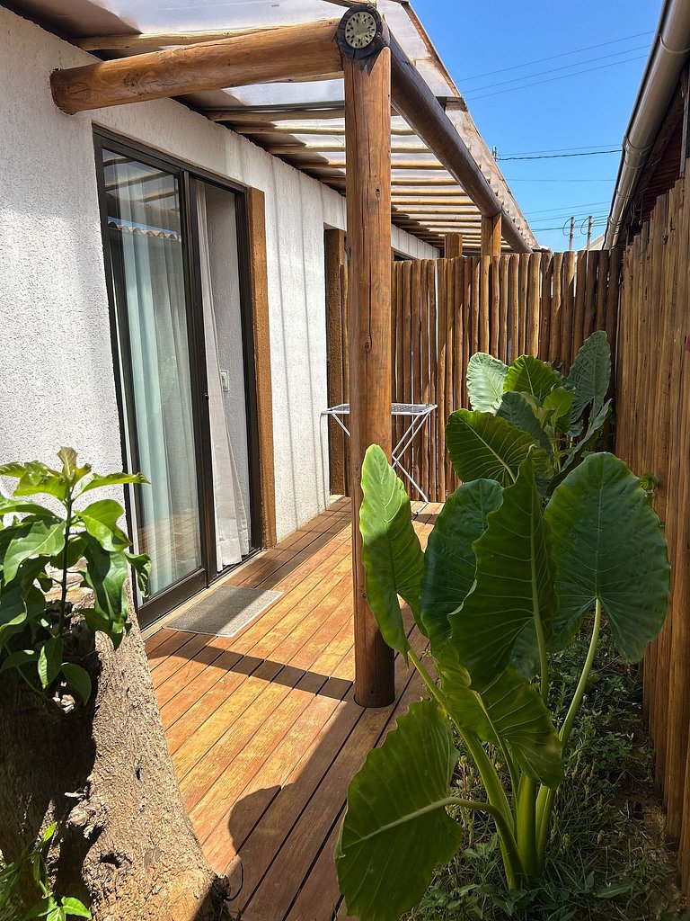 Suíte boutique com deck privativo [café/transfer]